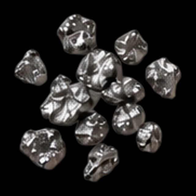 Small dark grey granules of selenium